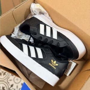 adidas Black and White Low-Top Sneakers with Gold Logo